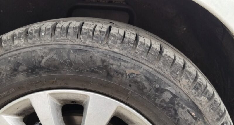check for uneven tire wear